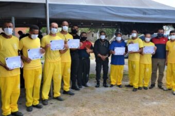 Prisoners graduate from car repair course at Barra da Grota Penal Treatment Unit, Tocantins, Brazil